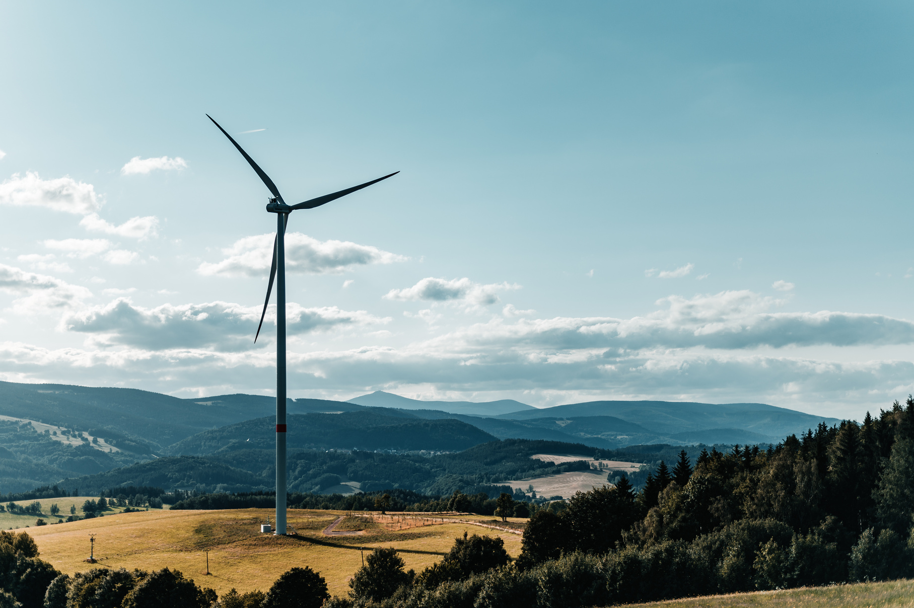 Wind Mill on Green Grass Field